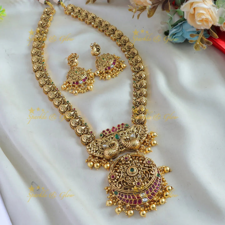 Stunning Peacock floral design long necklace with ruby emerald and gold beads - Sparkle and Glow