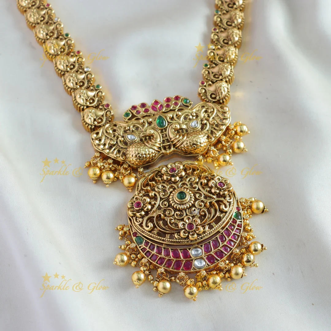 Stunning Peacock floral design long necklace with ruby emerald and gold beads - Sparkle and Glow