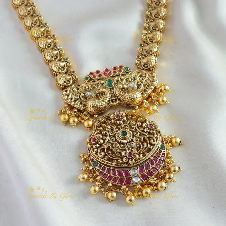 Stunning Peacock floral design long necklace with ruby emerald and gold beads - Sparkle and Glow