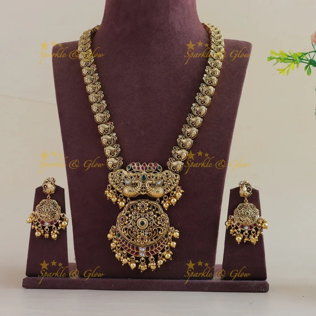 Stunning Peacock floral design long necklace with ruby emerald and gold beads - Sparkle and Glow