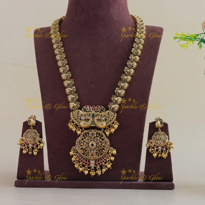 Stunning Peacock floral design long necklace with ruby emerald and gold beads - Sparkle and Glow