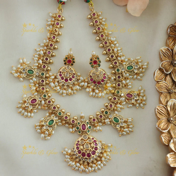 Elegant Floral gutta pusalu short necklace with ruby emerald and rice pearls - Sparkle and Glow