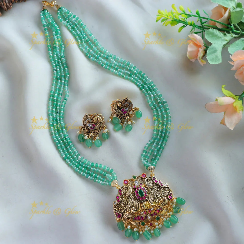 Stunning Peacock carved floral design pendant haram with multi layer mint green beads chain - Sparkle and Glow