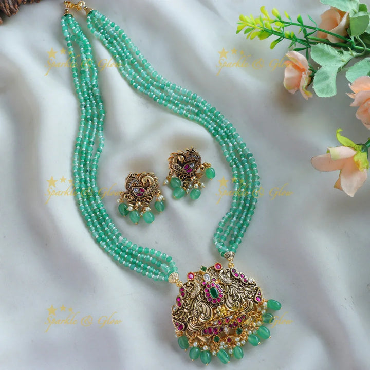 Stunning Peacock carved floral design pendant haram with multi layer mint green beads chain - Sparkle and Glow