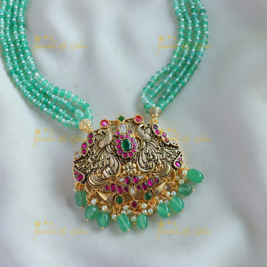 Stunning Peacock carved floral design pendant haram with multi layer mint green beads chain - Sparkle and Glow