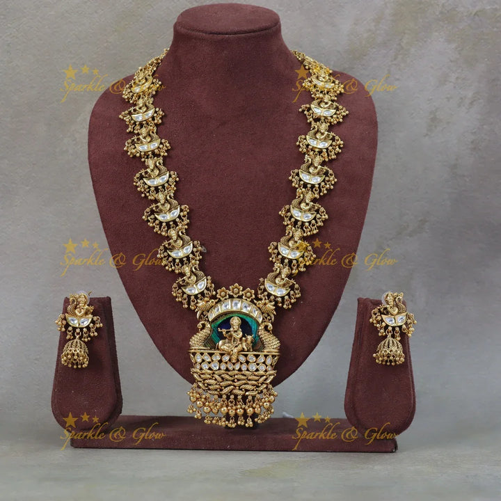 Statement Krishna playinng flute pendant kundan stone long necklace with green beads - Sparkle and Glow