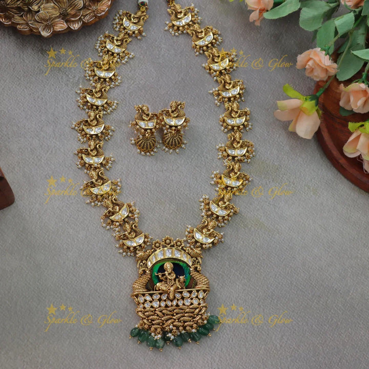 Statement Krishna playinng flute pendant kundan stone long necklace with green beads - Sparkle and Glow