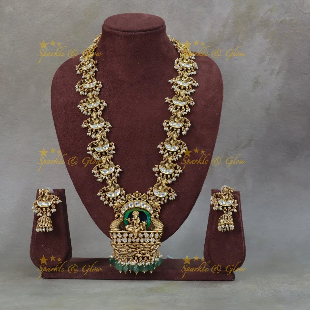 Statement Krishna playinng flute pendant kundan stone long necklace with green beads - Sparkle and Glow