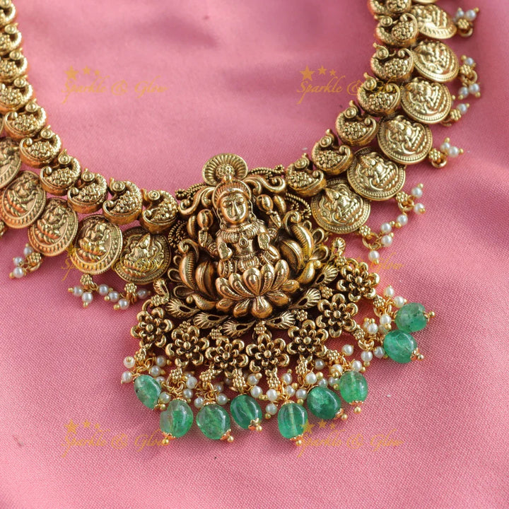 Beautiful Peacock Lakshmi coin long necklace with pearls and mint green beads - Sparkle and Glow