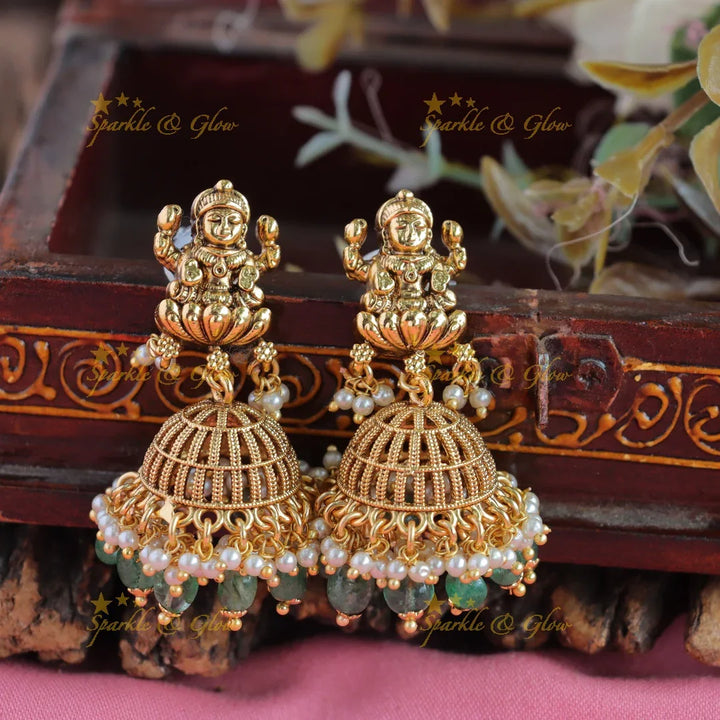 Beautiful Peacock Lakshmi coin long necklace with pearls and mint green beads - Sparkle and Glow