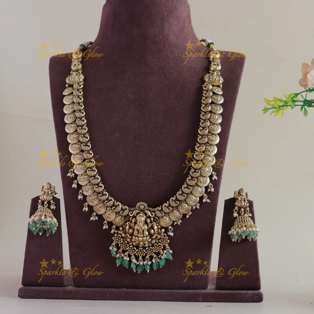 Beautiful Peacock Lakshmi coin long necklace with pearls and mint green beads - Sparkle and Glow