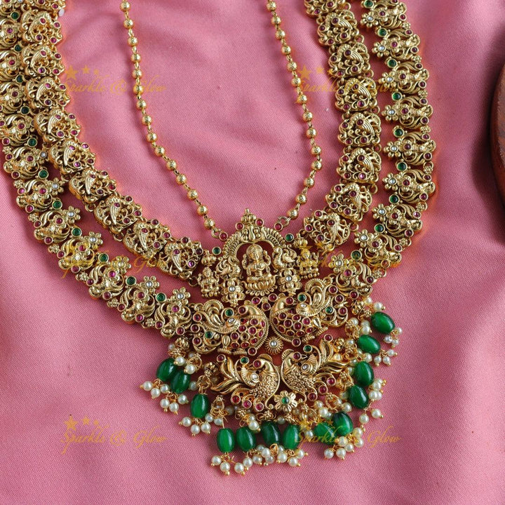 Exclusive Lakshmi peacock carved layer long necklace with ruby emerald gold and green beads - Sparkle and Glow