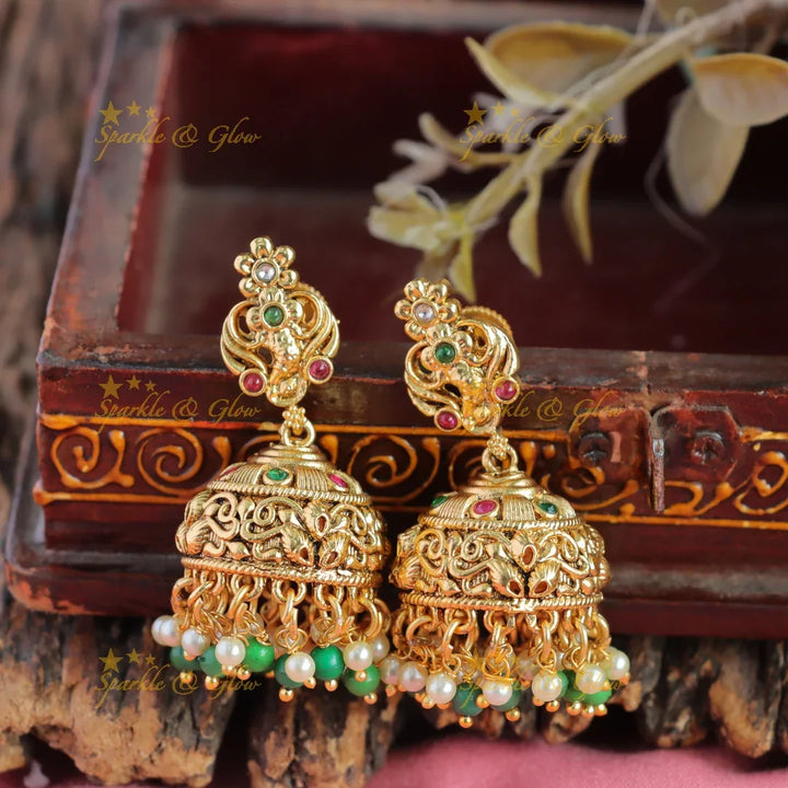 Exclusive Lakshmi peacock carved layer long necklace with ruby emerald gold and green beads - Sparkle and Glow