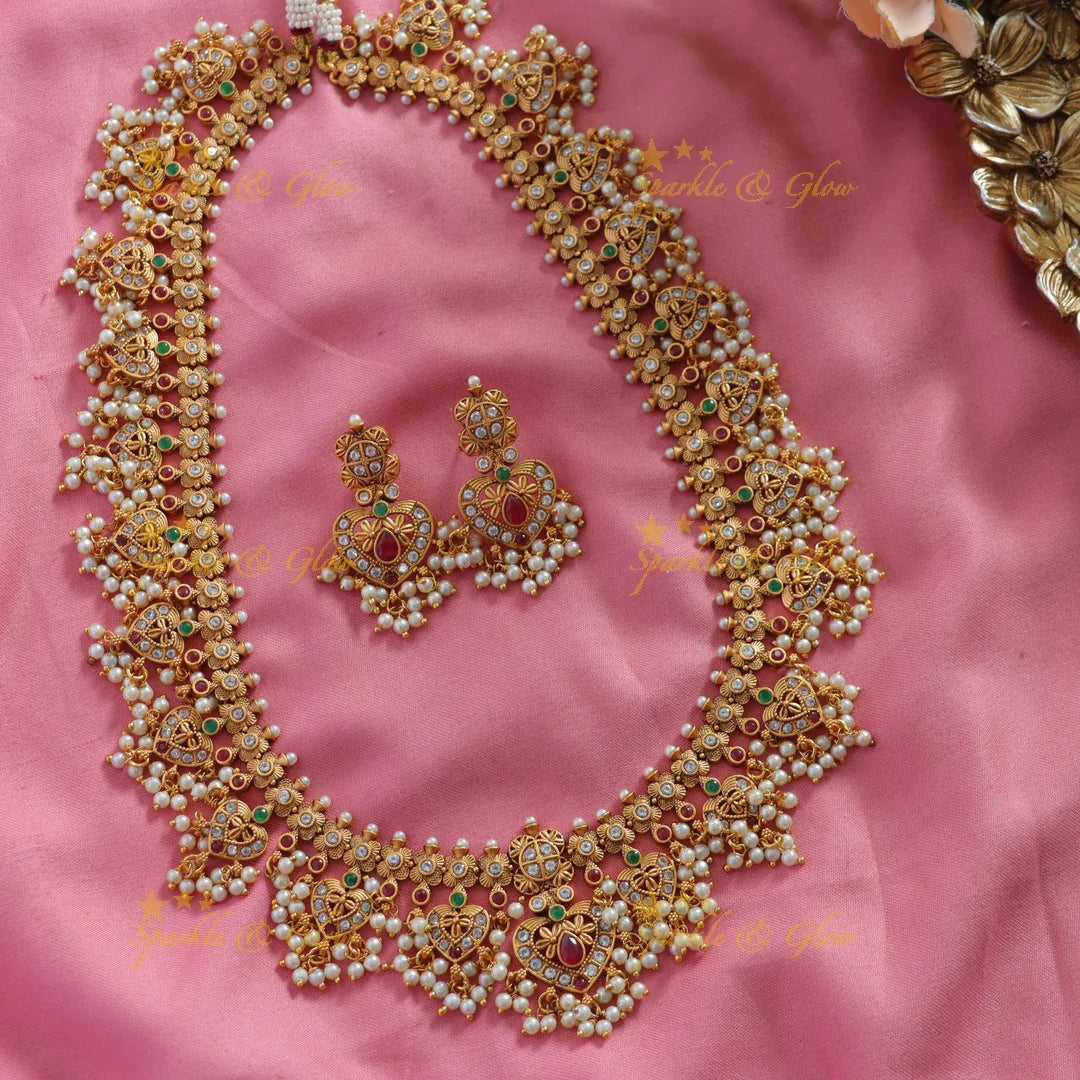 Stunning Leaf design gutta pusalu long necklace with ruby emerald and CZ stones - Sparkle and Glow