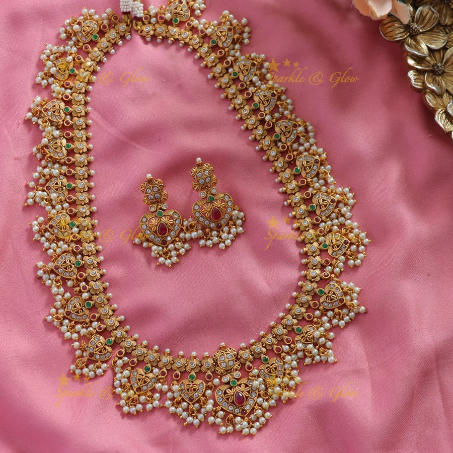 Stunning Leaf design gutta pusalu long necklace with ruby emerald and CZ stones - Sparkle and Glow