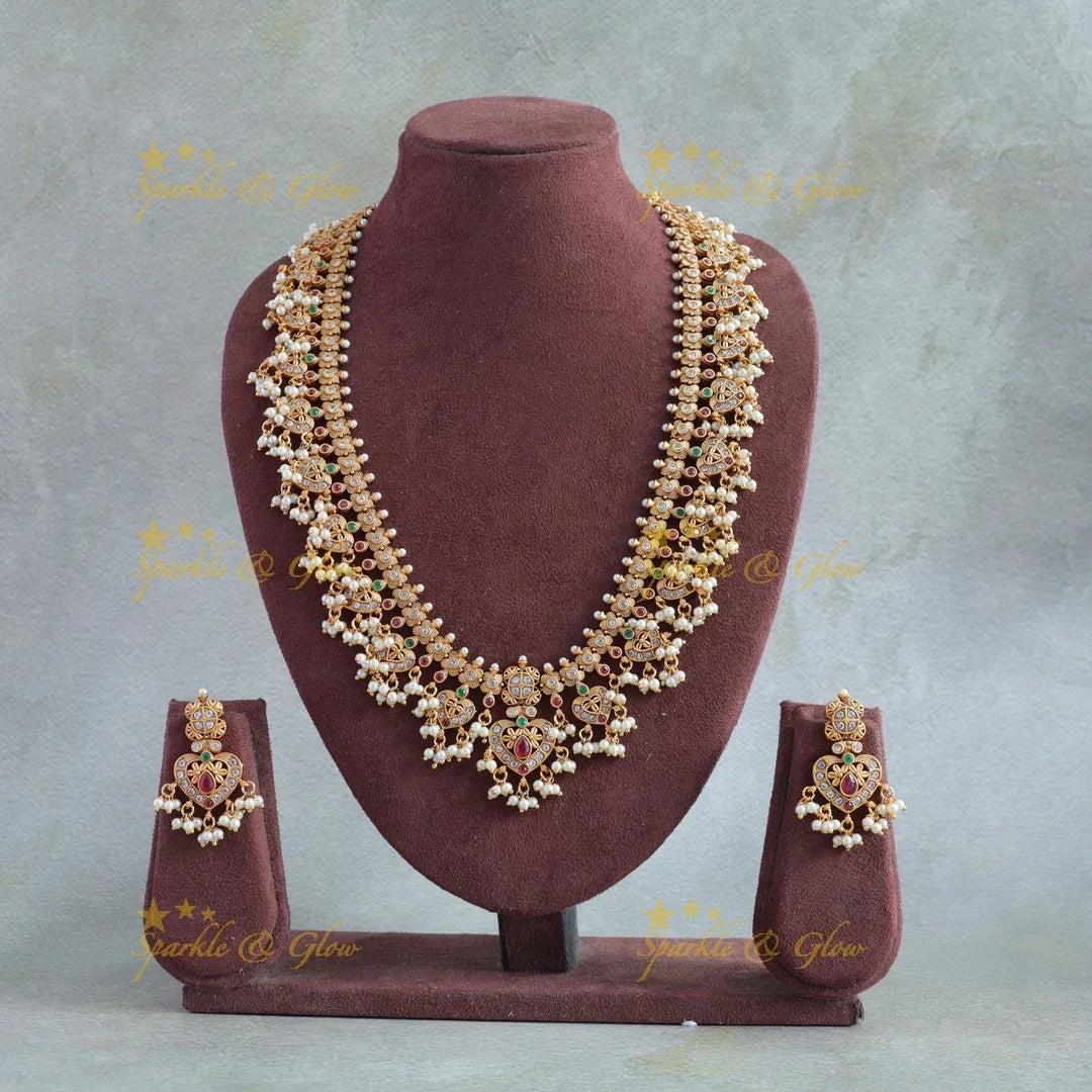 Stunning Leaf design gutta pusalu long necklace with ruby emerald and CZ stones - Sparkle and Glow