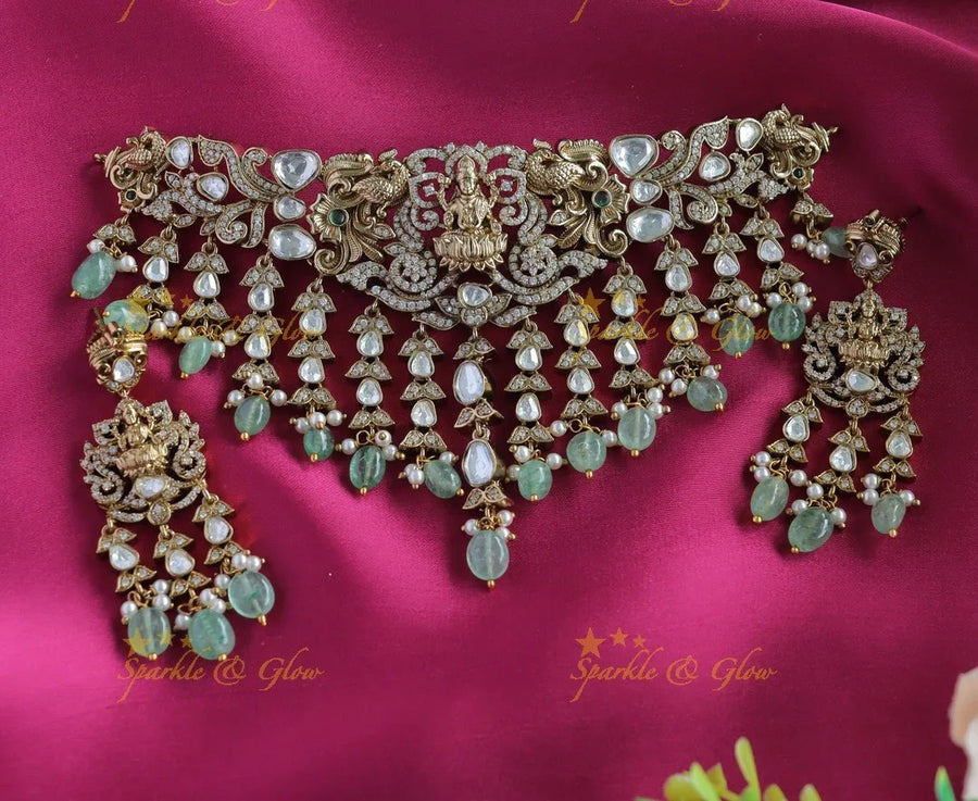 Elegant Idol Lakshmi Peacock carved Victorian AD choker with hanging mintgreen beads - Sparkle and Glow