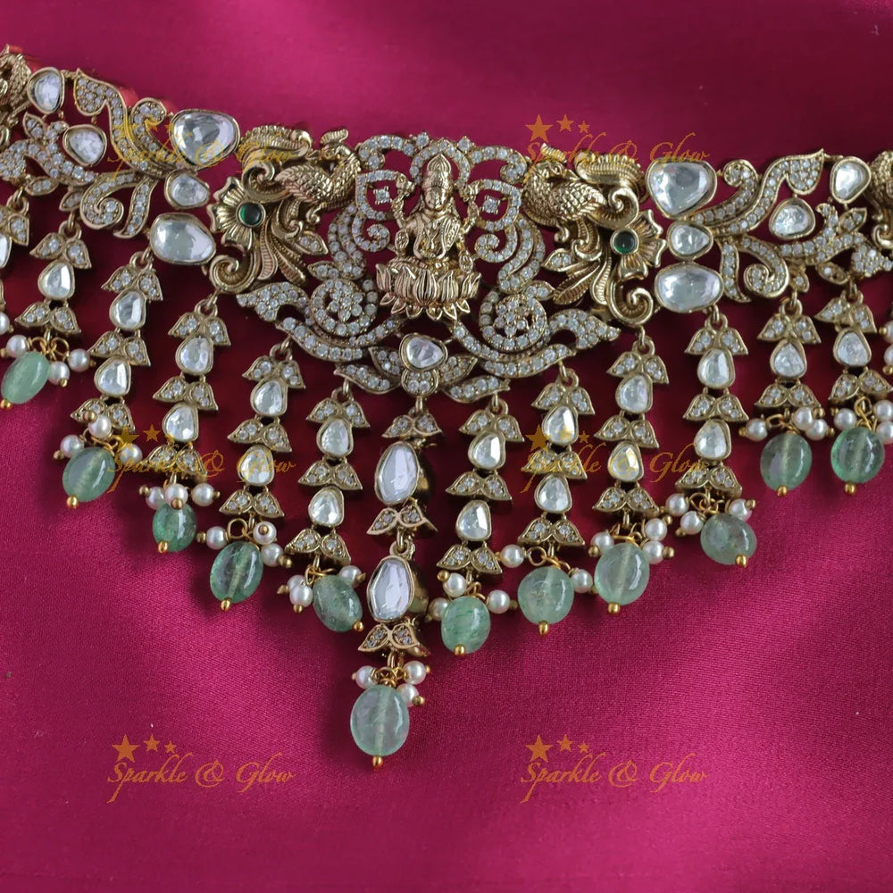 Elegant Idol Lakshmi Peacock carved Victorian AD choker with hanging mintgreen beads - Sparkle and Glow