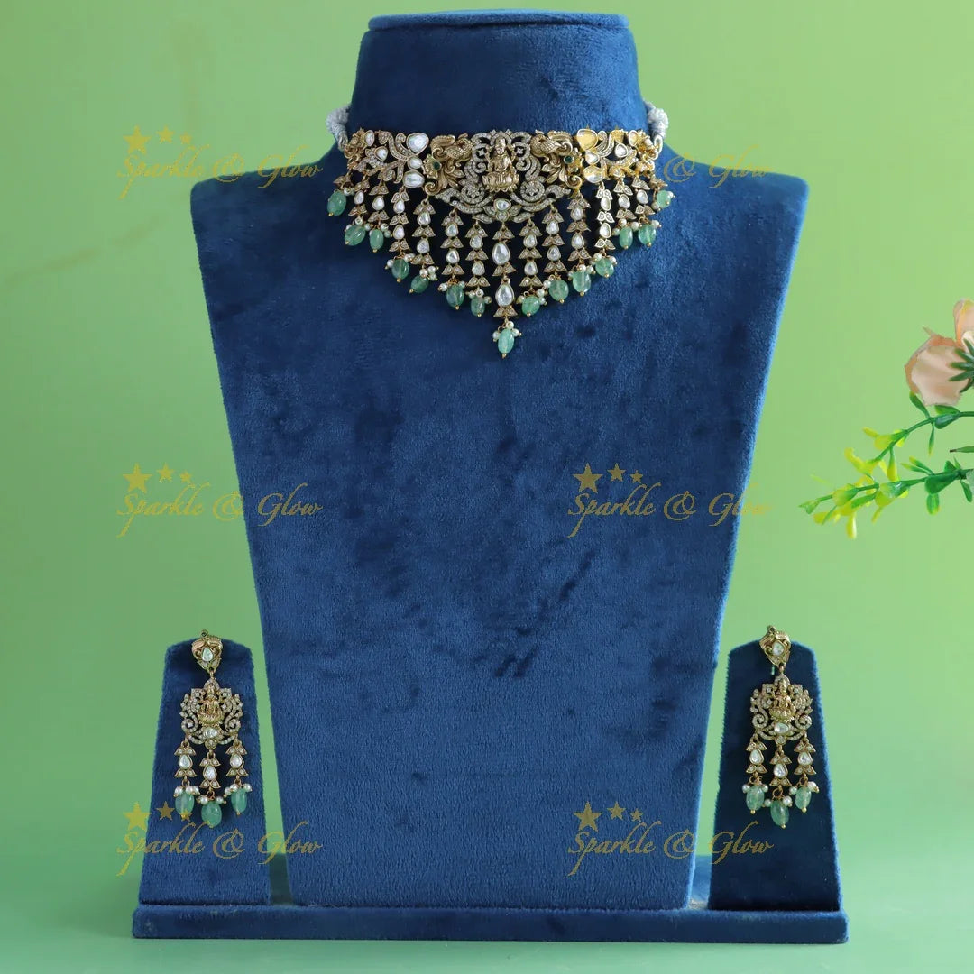 Elegant Idol Lakshmi Peacock carved Victorian AD choker with hanging mintgreen beads - Sparkle and Glow
