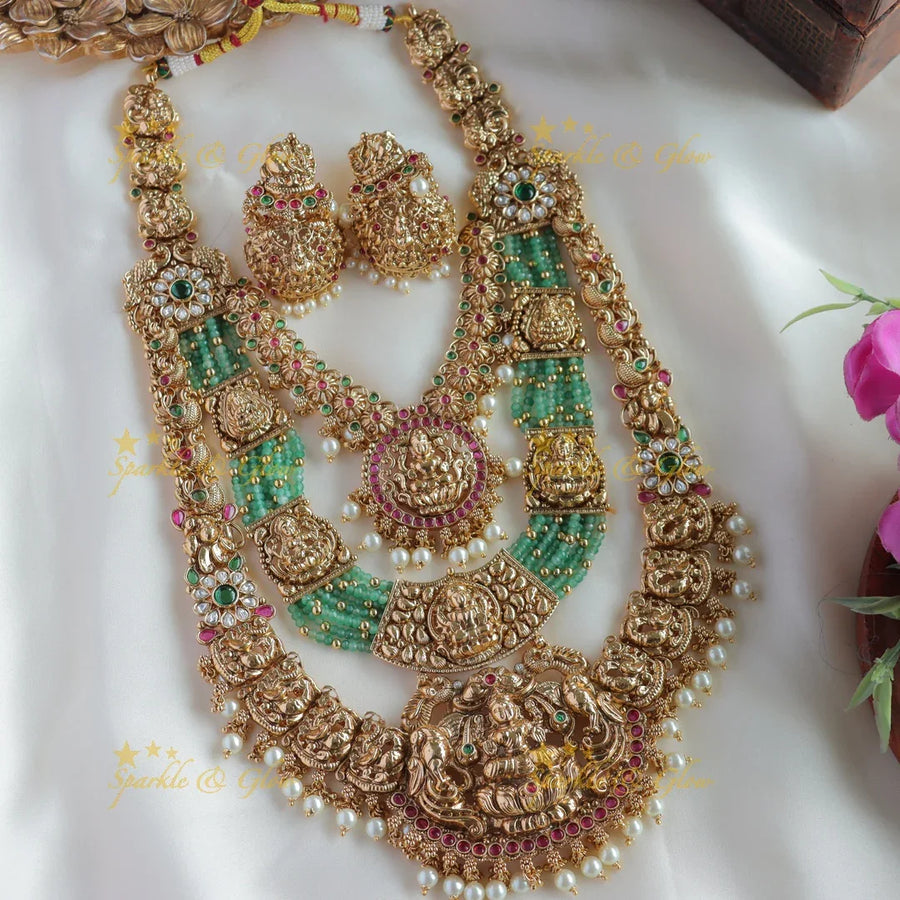 Grand Bridal Lakshmi peacock carved three layer haram with ruby emerald pearls and multi layer mint green beads - Sparkle and Glow