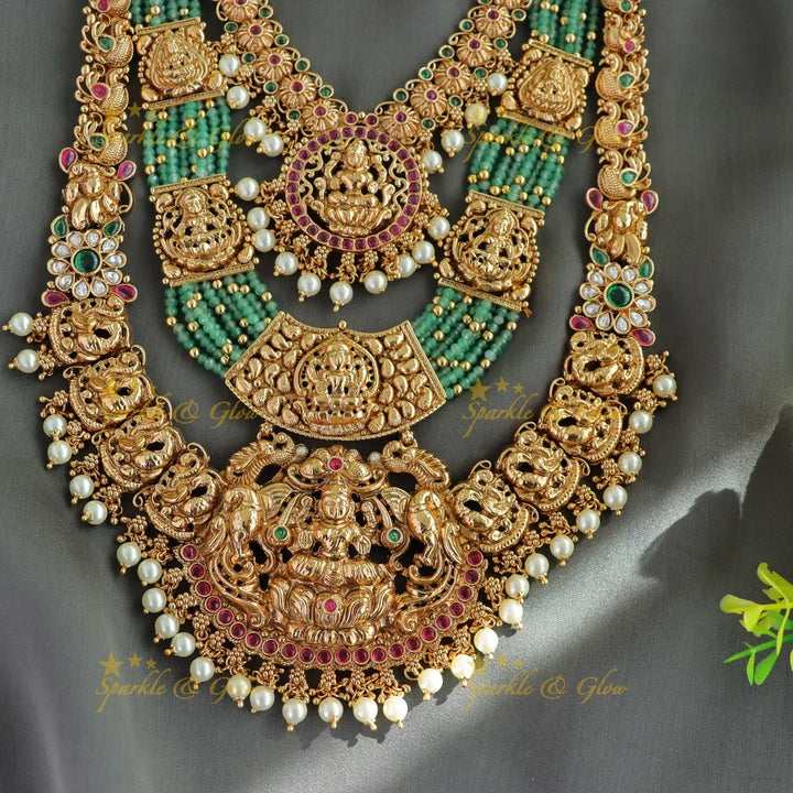Grand Bridal Lakshmi peacock carved three layer haram with ruby emerald pearls and multi layer mint green beads - Sparkle and Glow