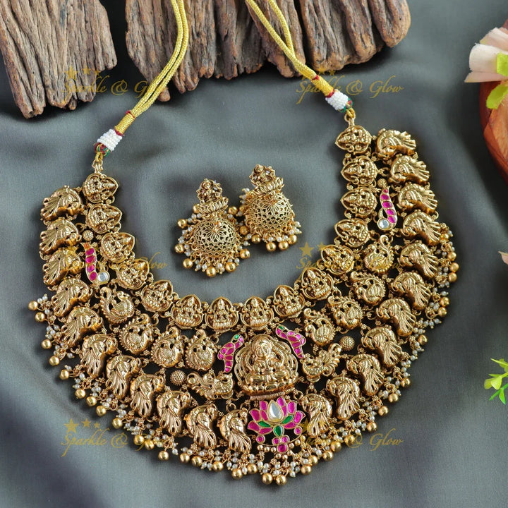 Grand bridal Lakshmi peacock carved lotus jadau short necklace with pearls and gold beads - Sparkle and Glow