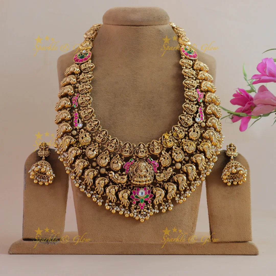 Grand bridal Lakshmi peacock carved lotus jadau long necklace with pearls and gold beads - Sparkle and Glow