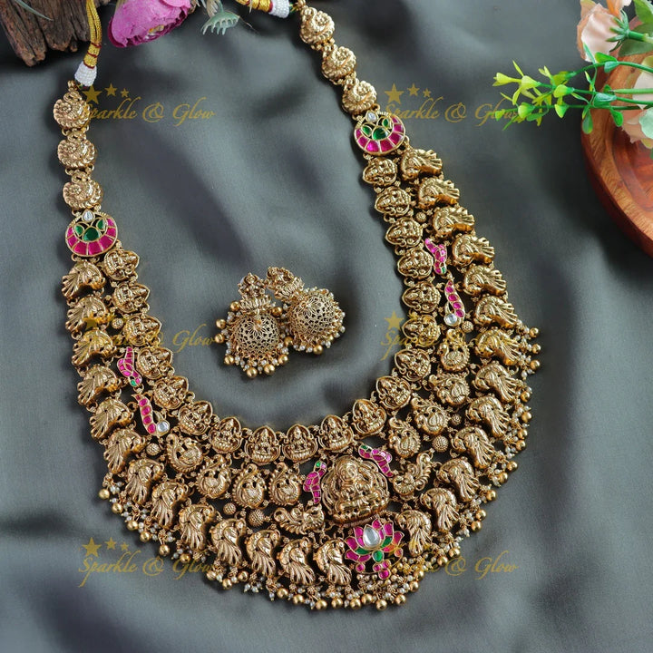 Grand bridal Lakshmi peacock carved lotus jadau long necklace with pearls and gold beads - Sparkle and Glow