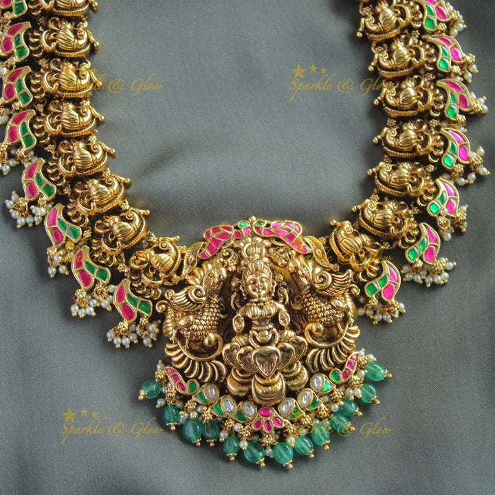 Exclusive Lakshmi peacock carved jadau long necklace with pearls and mint green beads - Sparkle and Glow