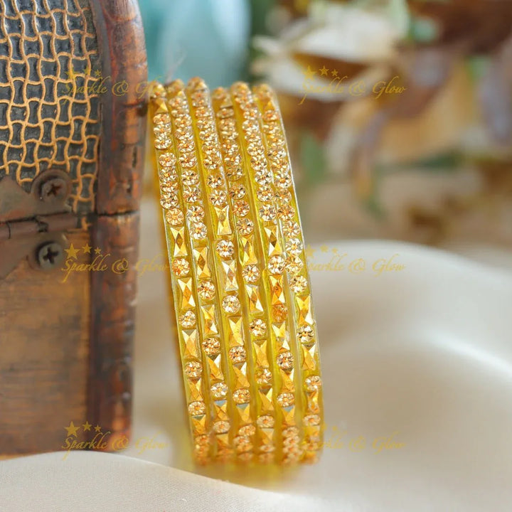 Exclusive Glass bangles set of 6 bangles, with gold design - Sparkle and Glow