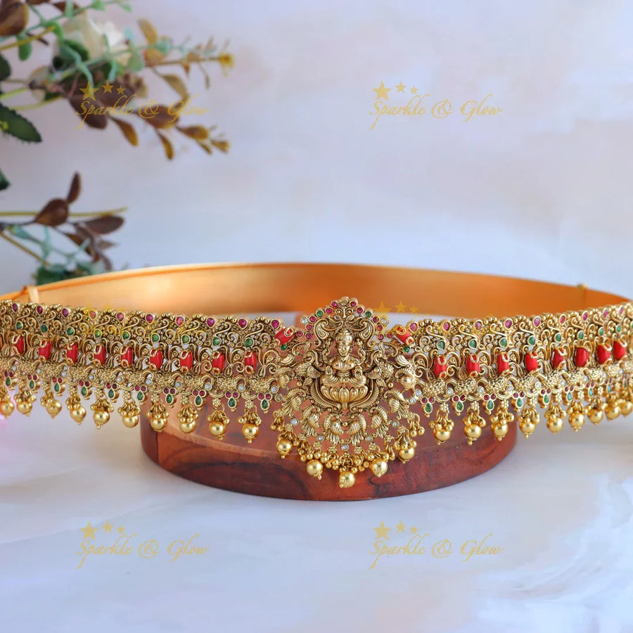 Grand Idol Lakshmi Peacock carved Coral and Gold beads Hipbelt - Sparkle and Glow