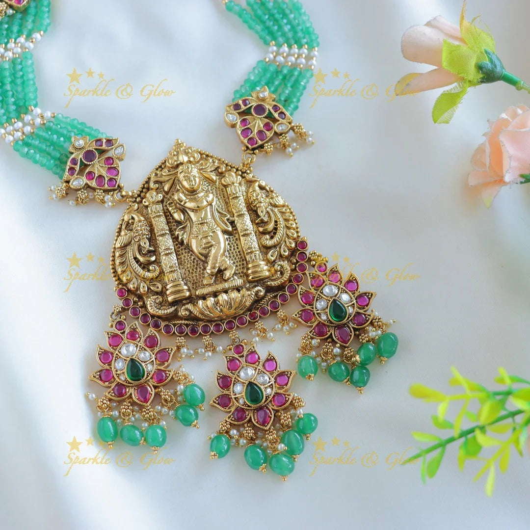 Grand Idol Krishna and Dancing peacock Haram with multilayered mintgreen beads - Sparkle and Glow
