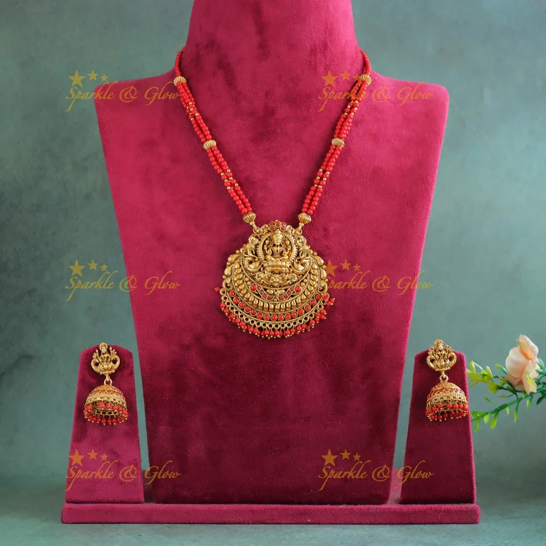 Sparkling Idol Lakshmi Peacock pendant carved Coral beaded Haram - Sparkle and Glow