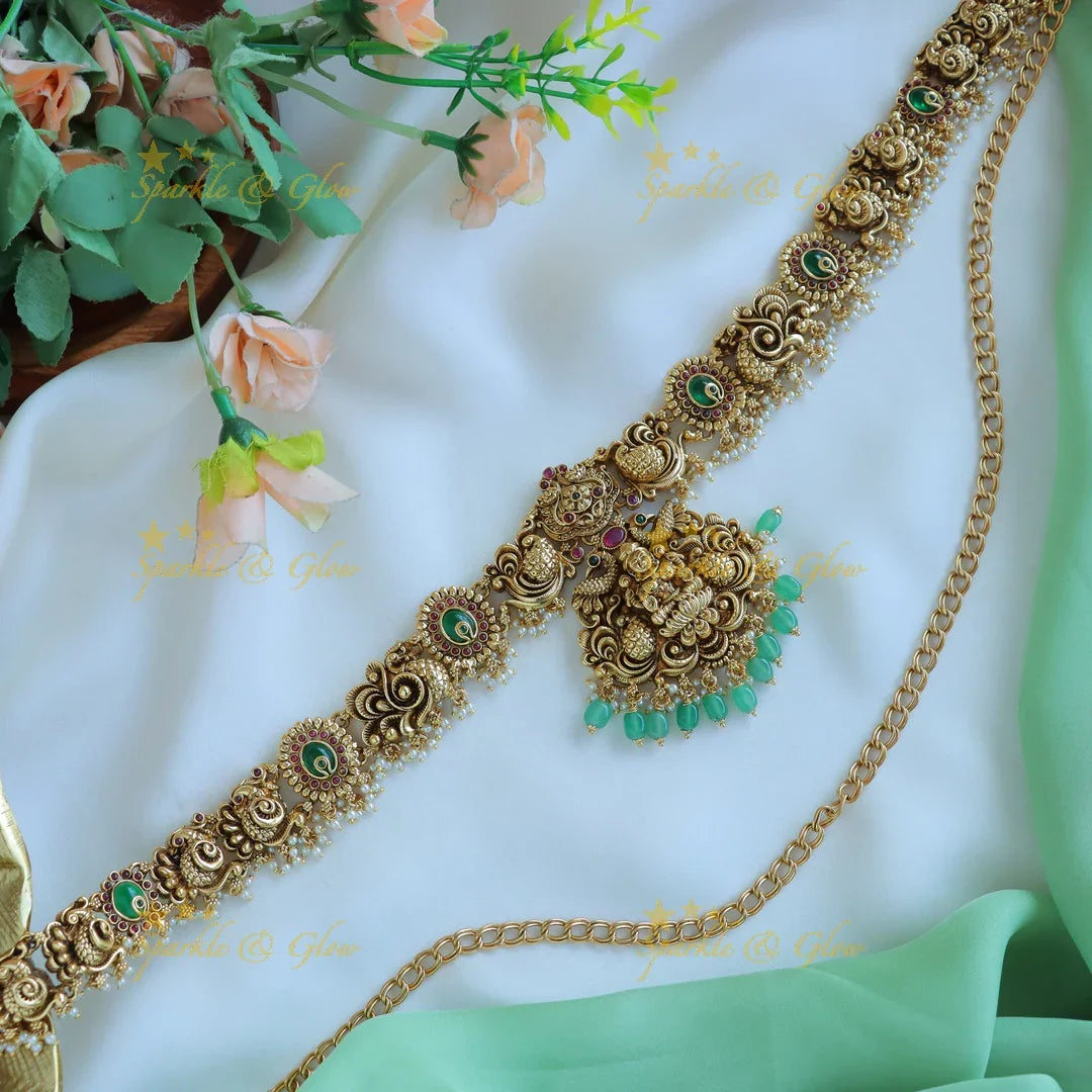 Gracious Idol Lakshmi Peacock carved Hipchain with green beads - Sparkle and Glow