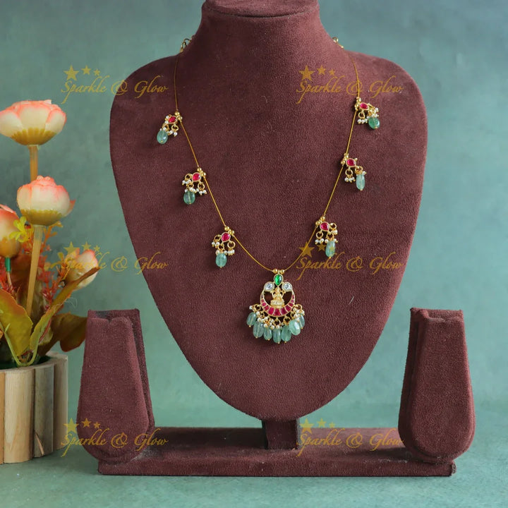 Gracious Half moon Idol Lakshmi floral invisible short necklace with mintgreen beads - Sparkle and Glow