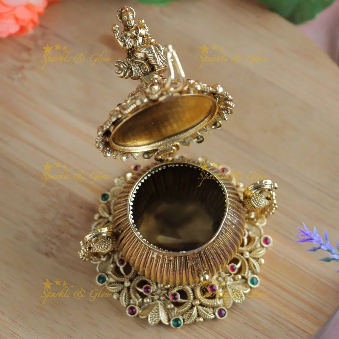 Gracious Idol Mahalakshmi on Lotus carved Kumkum Box - Sparkle and Glow