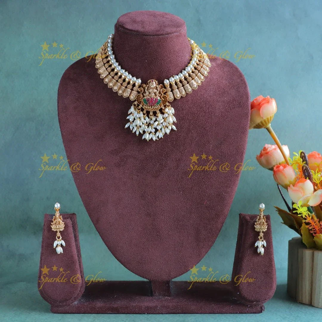 Sparkling Idol Lakshmi goemetric carved short necklace with rice pearls - Sparkle and Glow