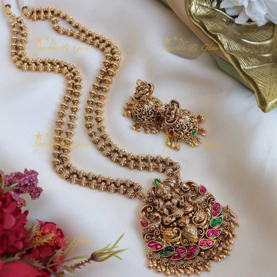 Elegant lakshmi and peacock design with gold beads long haram - pink,green - Sparkle and Glow