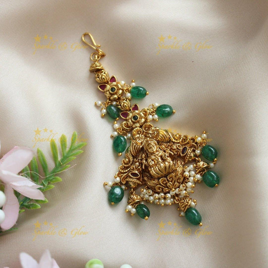 Elegant Idol Lakshmi Elephant carved kemp maangtikka with green beads - Sparkle and Glow