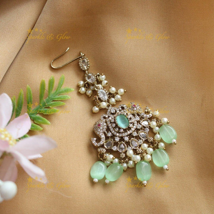 Sparkling Dual tone Elephant Floral Guttapusalu Victorian AD Maangtikka - Sparkle and Glow