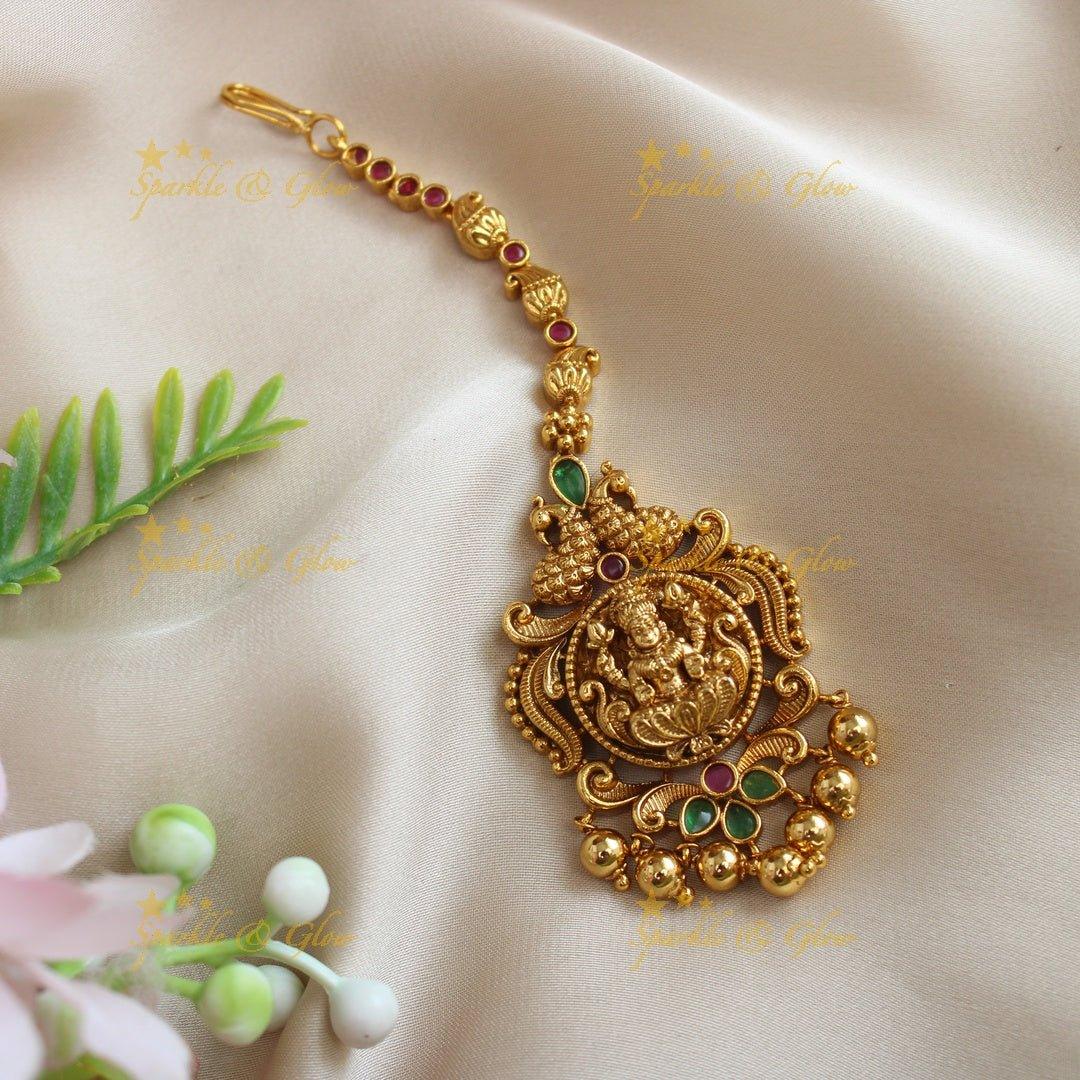 Statement Dual tone Peacock Lakshmi carved single line maangtikka - Sparkle and Glow