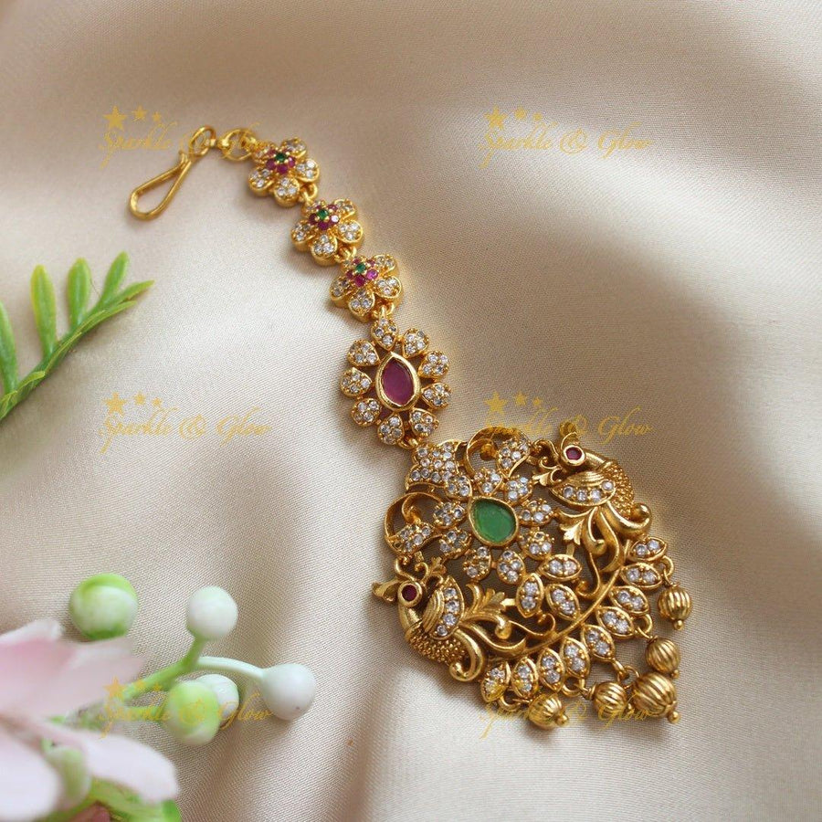 Statement Kemp Peacock Floral carved maangtikka with AD stones - Sparkle and Glow