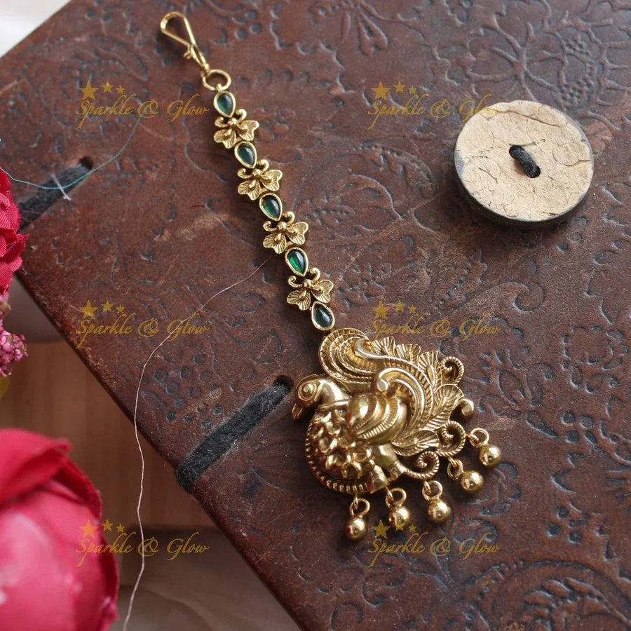 Beautiful Dancing Peacock Floral carved single line maagtikka with Emerald stones - Sparkle and Glow