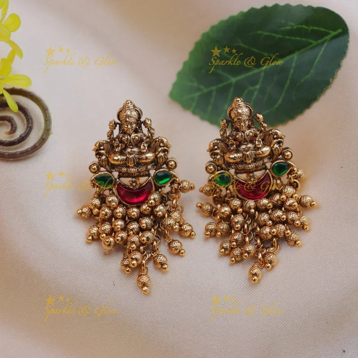 Beautiful lakshmi design jadau earrings - Pink - Sparkle and Glow