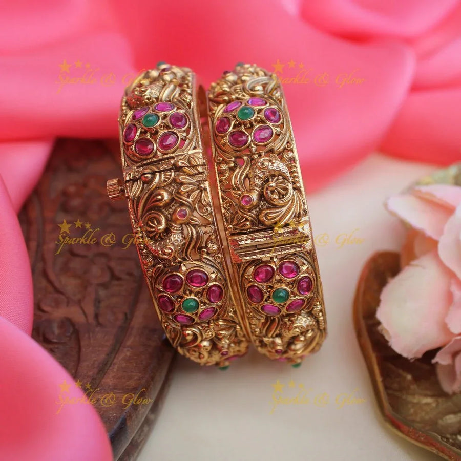 Gorgeous peacock and floral design screw type bangles - Sparkle and Glow