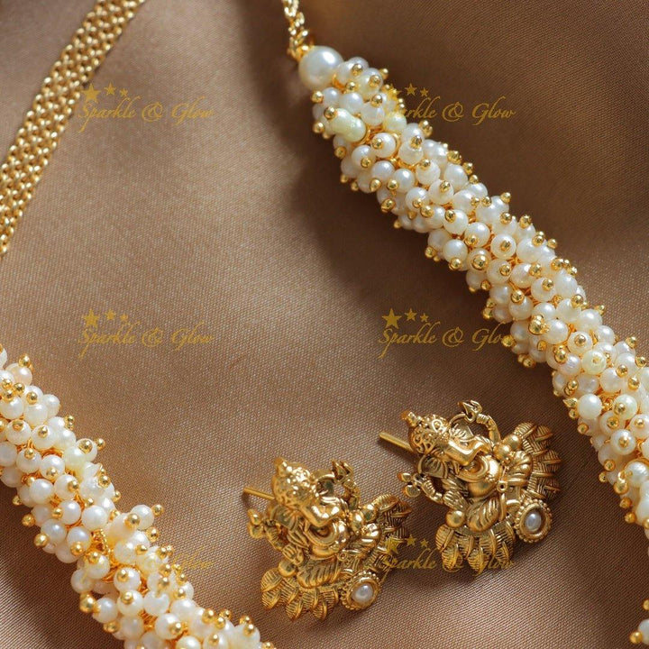 Gracious Idol Ganesha pendant carved pearl cluster short necklace - Sparkle and Glow