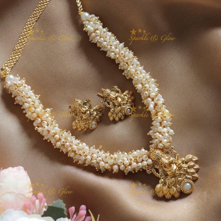 Gracious Idol Ganesha pendant carved pearl cluster short necklace - Sparkle and Glow
