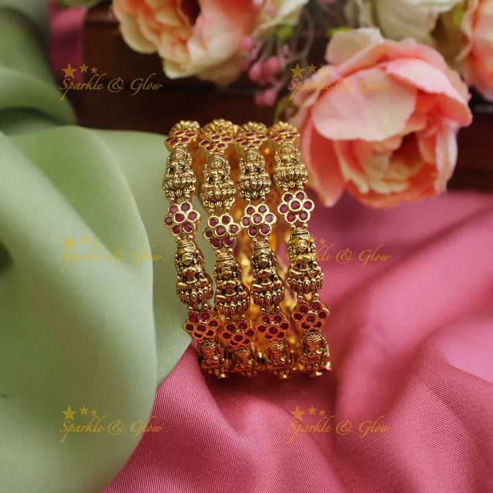 Simple and elegant lakshmi and floral design set of 4 bangles - Sparkle and Glow