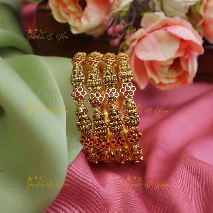Simple and elegant lakshmi and floral design set of 4 bangles - Sparkle and Glow