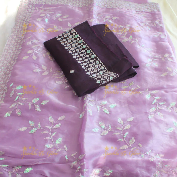 Beautiful leaf design lavender colour organza saree with dark purple blouse piece - Sparkle and Glow